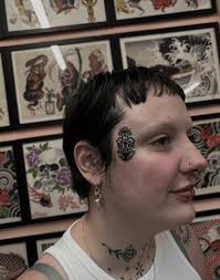 Image result for forehead tattoo