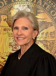 Interview with Judge Hogan Scola