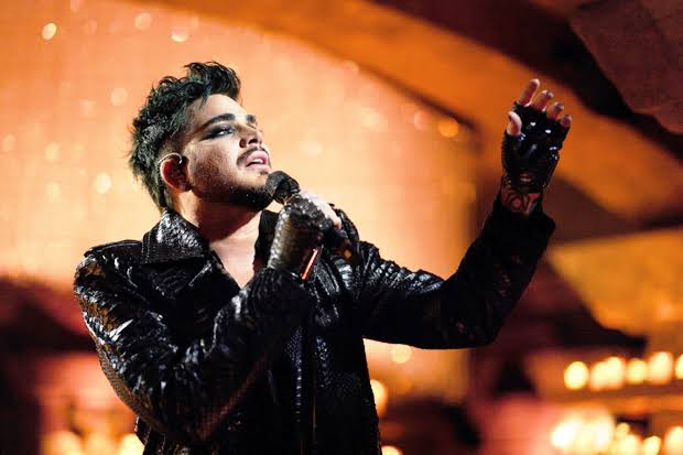 Adam Lambert Performs "The Show Must Go On" In Celebration Of 50 Years Of  Queen