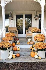 Pumpkins and chrysanthemums are a natural pair when it comes to fall decor. 65 Fall Porch Decorating Ideas Outdoor Fall Decor