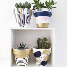 Painting terracotta pots isn't anything new, but i put my own twist on my new garden pots by stenciling them and adding stripes. 22 Creative Diy Terracotta Pot Painting Ideas Plantymist Painted Plant Pots Plant Pot Design Plant Pot Diy