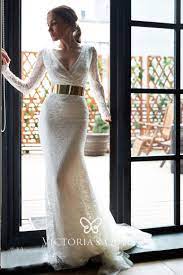 Angela didn't have a specific look in mind for the wedding, but knew that she didn't want it to be too traditional. Ivory Lace With Tulle Mermaid Long Sleeve Wedding Dress Wedding Dresses Long Sleeve Mermaid Wedding Dress Wedding Dress Long Sleeve