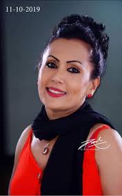 Songstress Corrine Almeida and her son Brandon Damian Ingram. Brandon  incidentally was a TV announcer and was also the main actor in the film  Funny Boy. He is also an accomplished singer .