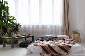 If letting your bed linens drape onto the floor or the platform bed frame just isn't your style, keep your bedroom feeling sharp and tidy by tucking your sheets under the mattress and removing any extra blankets or fluffy comforters. Bed Frames Necessity Or Extra Touch Curbed