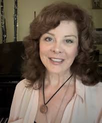 Merging” for solo flute and fixed electronics by Linda A. Marcel