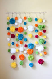 13 Diy Pom Pom Decor Ideas That Are Cuteness Overload Pom Pom Crafts Yarn Pom Pom Diy Pom Pom