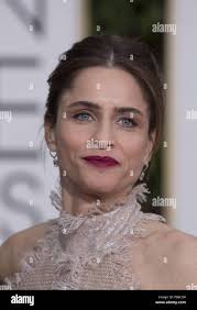 Amanda Peet arrives at the 73rd annual Golden Globe Awards