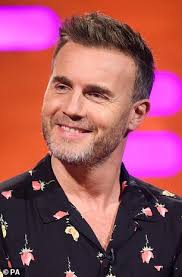 Robbie Williams' daughter Theodora surprises him with a GARY BARLOW card