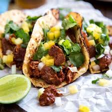 My Tacos Al Pastor Version Is Done In The Kitchen With Marinated Pork Flavored With Various Chiles Pineapple Onion Garlic And C Tacos Al Pastor Food Recipes