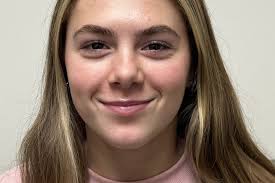 Softball: Dykhoff collects 100th hit, sparks Wolverines past Yellowjackets 