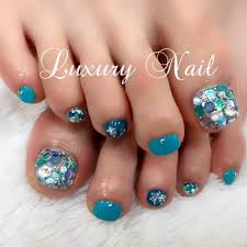 海ネイル リゾートネイル サマーネイル シェルネイル スターフィッシュ 貝殻ネイル ターコイズネイル ターコイズブルー スワロフスキー スワロ デートネイル キラキラ ネイルデザインを探すならネイル数no 1のネイルブック ペディキュアのネイルアート