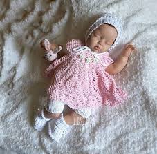 New mommies love dressing their little ones in cute clothes. Hand Knit Baby Set Knitted Baby Clothes Knitted Baby Girl Etsy Knitted Baby Clothes Crochet Baby Clothes Baby Knitting