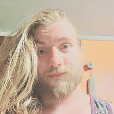 Who specializes in specialty concrete for an exposed aggregate patio?