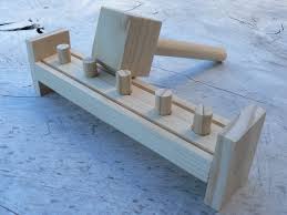 Handcrafted Wooden Peg And Hammer Toy Made From Pine Wood This Version Of The Toy Allows You To Hammer The Pegs Through To The Wooden Diy Kids Wood Wood Toys