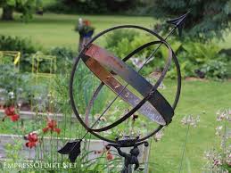 Metal flowers yard art near me. 29 Rusty Garden Junk Art Ideas Empress Of Dirt