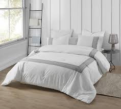 Once you add that touch of flavor you get a bedroom that is very tasty indeed. White Super Soft Cotton Oversized King Comforter With Stylish Gray Border Design And Machine Washable Material