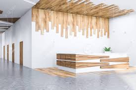 Modern wooden wall decor design ideas and living room interior wall decorating ideas 2021 from diy wood wall treatments that will brighten up your space. Hall Of Modern Office With White And Wooden Walls Row Of Wooden Stock Photo Picture And Royalty Free Image Image 127270705