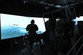 Sailors assigned to Maritime Expeditionary Security Group (MESG) 2 and  Maritime Expeditionary Security Squadron (MSRON) 2, participate in a  simulated training mission