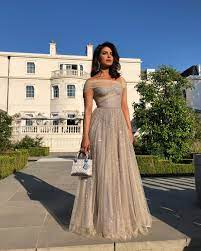 Just the right type of dress for the royal wedding night reception! Stars Change Outfits For The Royal Wedding Evening Reception Prince Harry And Meghan Markle S Evening Reception