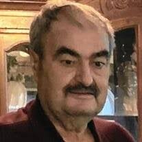 George T. Thomos Obituary