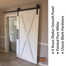 Black And White Barn Door This X Brace Shaker Smooth Panel Was Placed Over A Master Bedroom In Phoenixaz Painted Pure White Barn Doors Sliding Barn Door Decor Interior Barn Doors