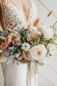 You can create a beautiful wedding bouquet in a matter of minutes! Dusty Blue And Blush Romance Bridal Bouquet Blue Blue Wedding Flowers Blue And Blush Wedding