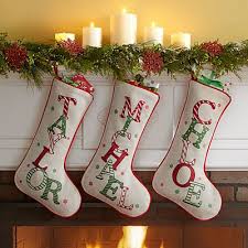 Christmas wooden letters on snow background. Christmas Stockings Personal Creations