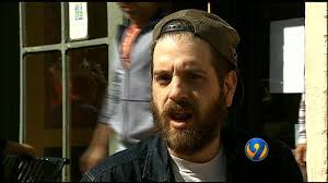 Artist injured in bicycle crash talks about recovery, dangers