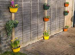 Whether you're looking to expand your garden or just want to add some liveliness to your space, you'll find an assortment of pots and planters at walmart.com. 9 X Premium Curved Garden Planters For Fences Colourful Amp Attractive Green Yellow Black And Terracotta Decorative Medium Size 4 Litre Plant Pot Planters With Fixings For Walls Wooden Fences Posts 9 X