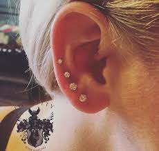 quadruple ear piercing we are open 7 days a week to make you sparkle ear piercings piercing body jewelry