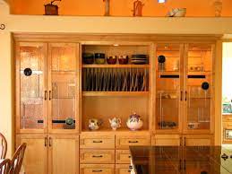 While frame and mullion doors have a functional purpose, using designer glass will achieve a more dramatic look. Cabinet Doors With Rondels Renegade Art Glass