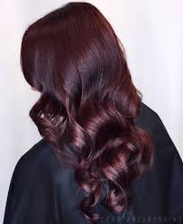 Burgundy hair toes the fine line between red and purple; 25 Red And Black Ombre Highlights Hair Color Ideas May 2020