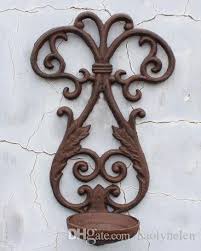 Queta gold wall candle holders fit tealight candle or pillar candle set of 2,wall candle holder decorations for living room,wedding, dinning and party. Cheap Wall Mounted Sconce Cast Iron Candle Holder Rustic Brown Metal Crafts Candlestick Rural Outdoor Garden Porch Home Decor Vintage From Haolyhelen 66 34 Dhgate Com