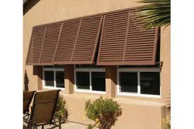 What makes a bahama shutter a bahama shutter is really the fact that the shutter is hinged at the top like an awning. The Plantation Shutter Company Brunswick Ga Us 31522 Houzz