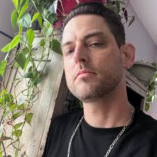 Sorry for the noob question. Yesterday I rescued a dwarf, specifically a  cook. How do I get him to spawn in my base? I built all the new kitchen  items (frying pan,