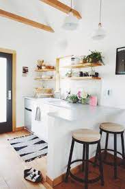 Rise to the challenge of designing for the smallest of small kitchens, from the rv to the urban apartment. A Tiny Scandinavian Cabin In Portland Tiny House Kitchen Tiny Kitchen Design Kitchen Design Small