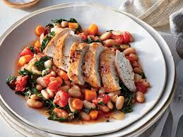 The Main Chicken Starch White Beans And Veggie Side Carrots Kale And Tomatoes Are All Included I Cooking Light Recipes Poultry Recipes Chicken Dinner