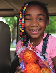 A MOTHER GIVING BACK A COMMUNITY STEPPING UP