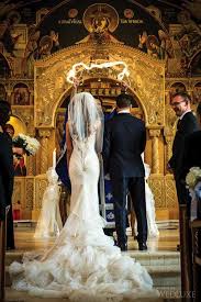 A Traditional Greek Wedding Meets Sleek Sophistication Wedluxe Magazine Greek Wedding Dresses Greek Wedding Greek Wedding Traditions