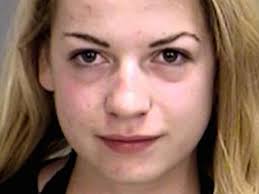 Student 'taking topless selfie' crashes into back of police car