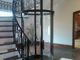 Suxun elevator covers passenger elevator, panoramic elevator, bed elevator, freight elevator, villa elevator, dumbwaiter elevator, escalator and moving walk. Glass Panel Home Elevator Fits Perfectly Inside A Spiral Staircase Exclusively By Nationwide Lifts House Construction Diy House Design House Elevation