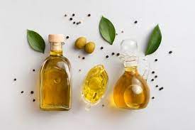 Olives Oil On Tables With Leaves And Olives Essential Oils For Skin Olive Oil What Are Essential Oils