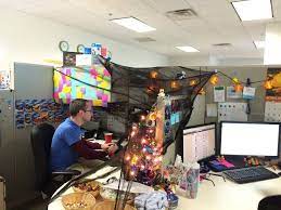 Then, if one day you are tired of the fishing or golfing look, you simple change the accessories and you're done. Fun And Spooky Halloween Office Decor Ideas Cubicle Decor Office Halloween Decorations Halloween Cubicle
