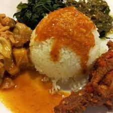 Sertakan juga 1 bungkus tuh isinya apa aja. Ratu Sari Masakan Padang Restoran Padang