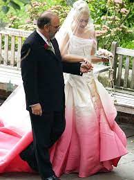 Top 10 Most Iconic Wedding Dresses Of History Famous Wedding Dresses Gwen Stefani Wedding Dress Celebrity Bride