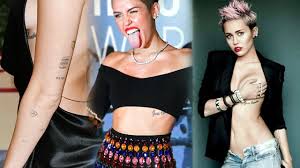 It seems that there are a lot of tattoos on miley's body that honor other people, or are a memory of something that happened, so we can easily consider her body a beautiful journal. Miley Cyrus Body Tattoos Usa Singer Miley S All Known Tattoos Till Yet
