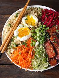 These 25 healthy and creative buddha bowl recipes are filled with fresh vegetables, warm proteins, and deliciously paired sauces or dressings! Vegetarian Recipes Asian Vegetarian Rice Bowl Recipes