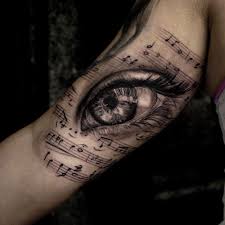 It's a beautiful and simple design. Musical Eye Girls Arm Piece