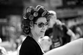 Keeping your hair pulled tight and high, start to roll the ends around the roller using the grip of the velcro to get the hair to stick. How To Use Velcro Rollers Bellatory