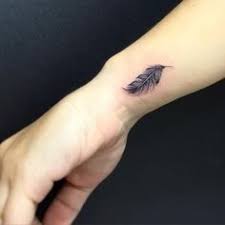 Best 100 Feather Tattoo Designs And Meanings Feather Tattoo Design Feather Tattoo Wrist Feather Tattoos